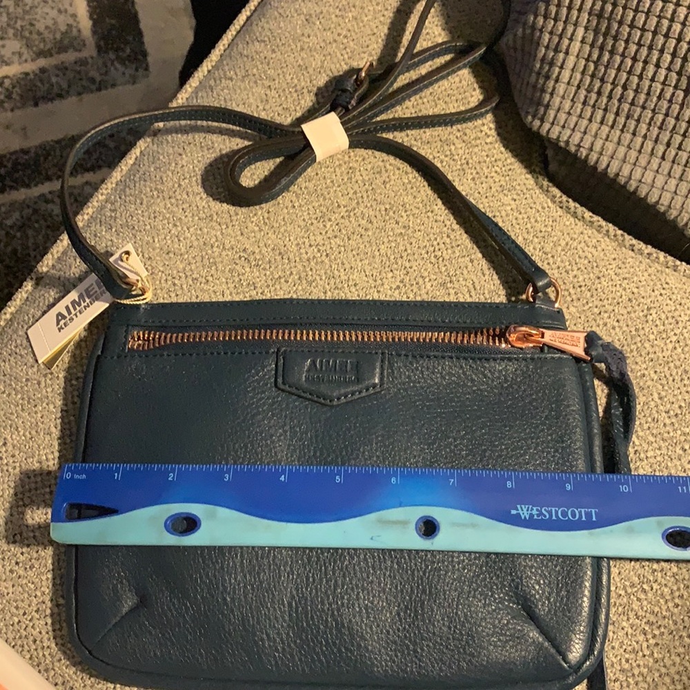 Leather cross body. Blue leather 9 X 7